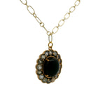 Collier doré fleur avec onyx noire cabochon et labradorite 60 cm