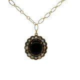 Collier doré fleur avec onyx noire cabochon et labradorite 60 cm