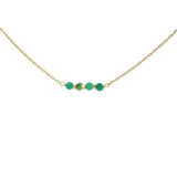 Golden necklace with natural stones and golden pearls