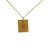 Gold horseshoe necklace with white zircon clover