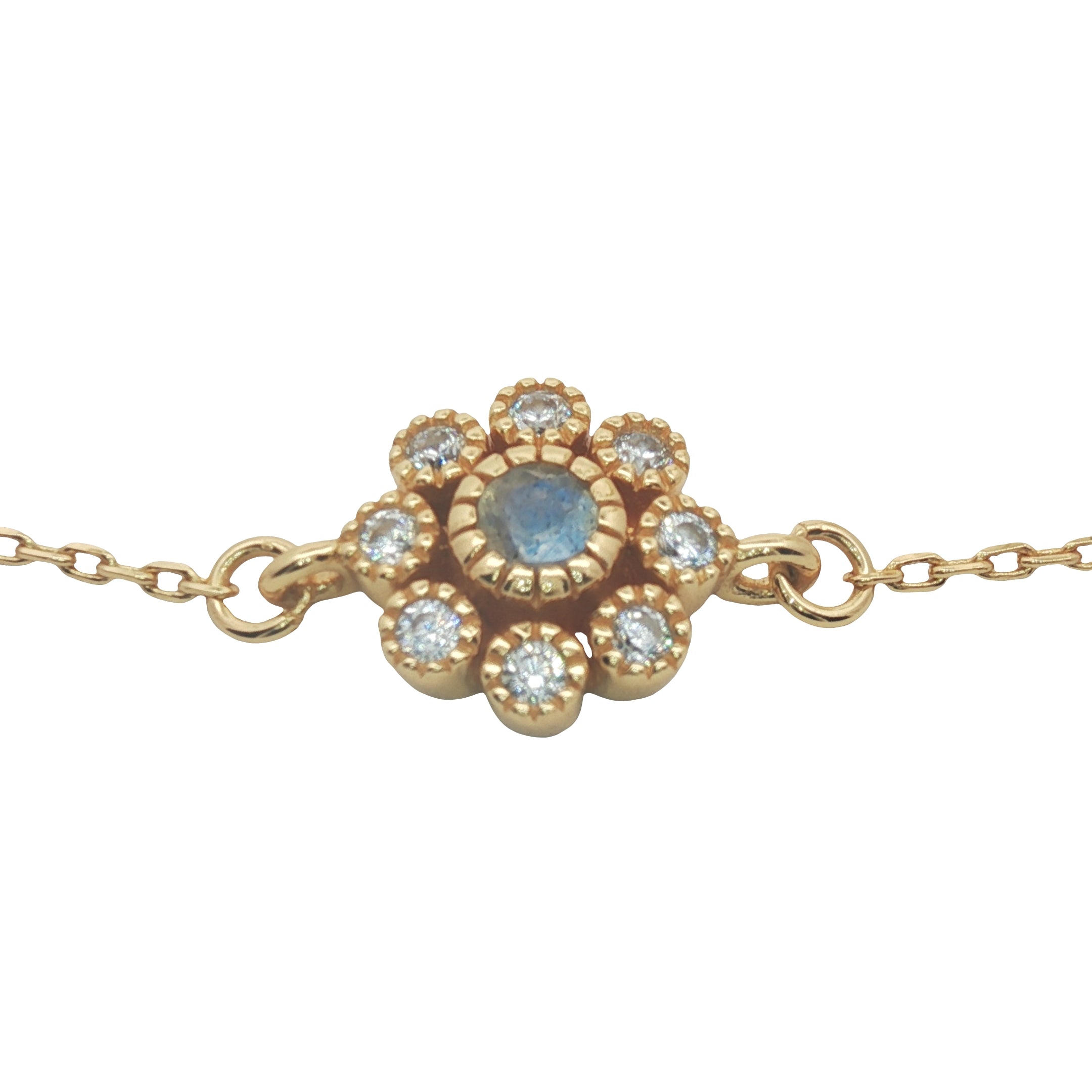 Gold bracelet with flower, stone and zircons