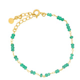 Gold bracelet with small stones