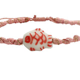 Bracelet cordon tressé rose et doré poisson blanc et rose