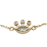 Gold crown bracelet with stone and zircons