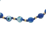 Bracelet doré perles bleues oeil et dorées