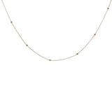 Collier doré maille boules espacées