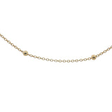 Collier doré maille boules espacées