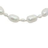 Bracelet doré alternance de petites et grandes perles de culture fil blanc
