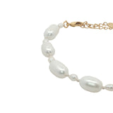 Bracelet doré alternance de petites et grandes perles de culture fil blanc
