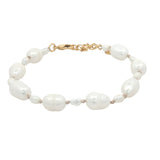 Bracelet doré alternance de petites et grandes perles de culture fil beige