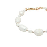Bracelet doré alternance de petites et grandes perles de culture fil beige