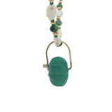 Collier doré fleur taillée dans de l'onyx verte perles de culture et dorées 60 cm