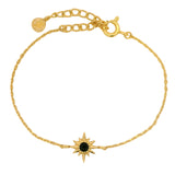Bracelet doré étoile des vents et onyx noire