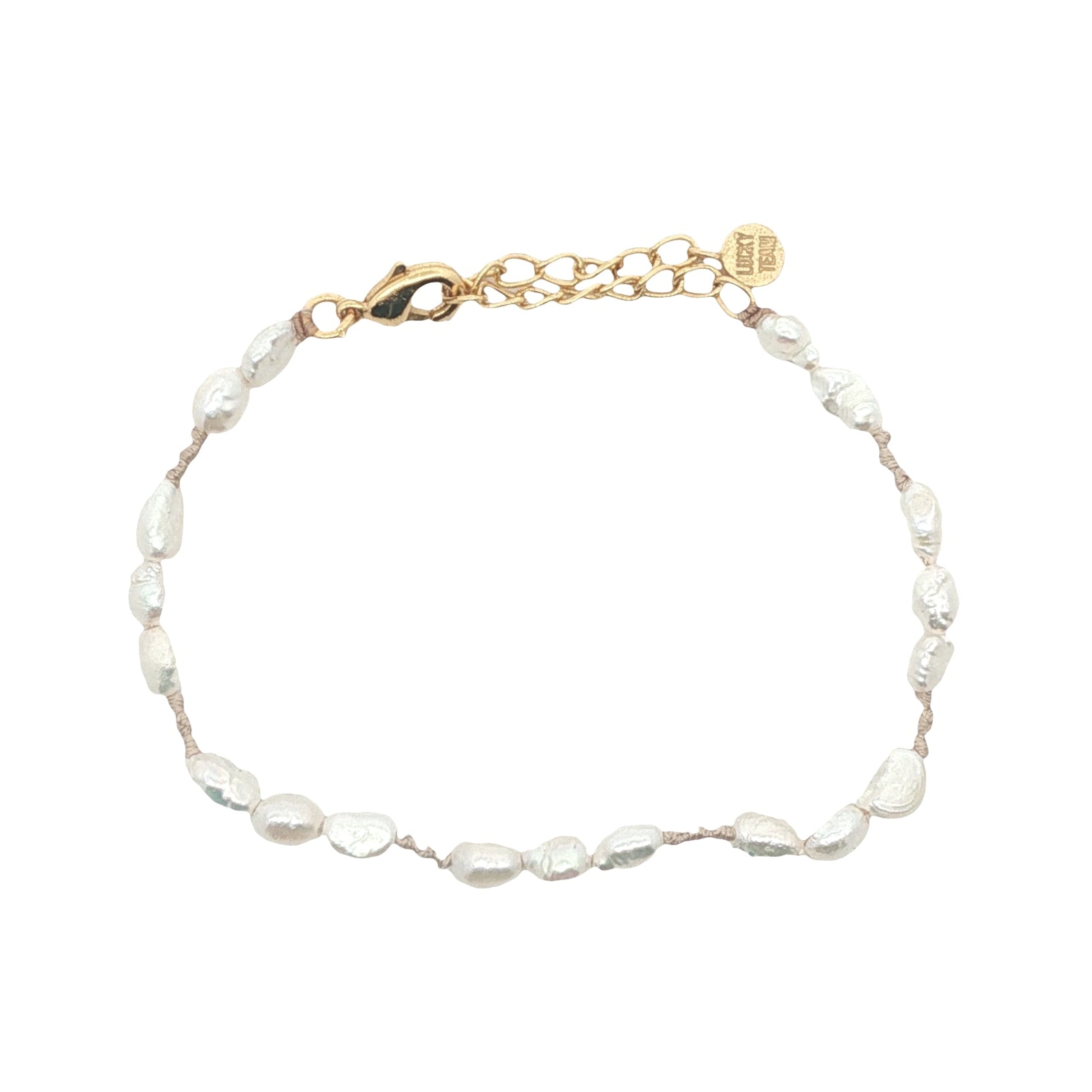 Bracelet doré alternance perles de culture et noeuds beige