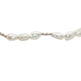 Bracelet doré alternance perles de culture et noeuds beige