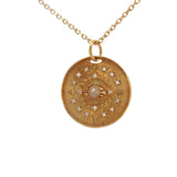 Gold necklace with eye stone and zircon medal