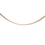 Gold necklace with a domed, stamped curb chain