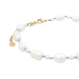 Chaine de cheville dorée petites et grandes perles de culture fil turquoise