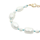 Bracelet doré alternance petites et grandes perles de culture fil turquoise