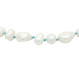 Chaine de cheville dorée perles de culture de différentes tailles et fil turquoise
