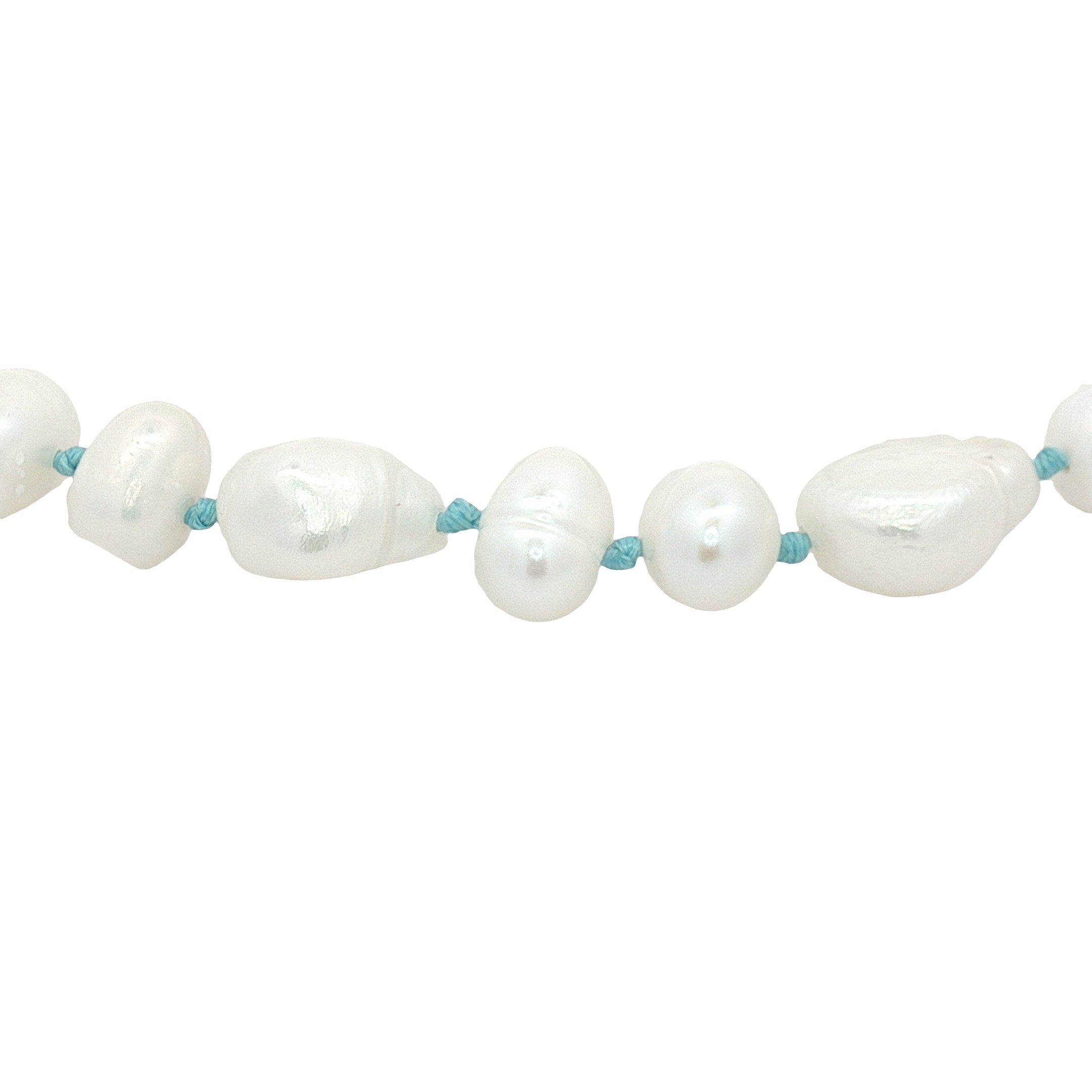 Chaine de cheville dorée perles de culture de différentes tailles et fil turquoise