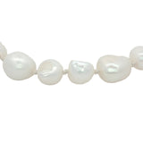 Chaine de cheville dorée perles de culture de différentes tailles et fil blanc