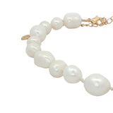 Chaine de cheville dorée perles de culture de différentes tailles et fil blanc
