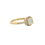 Golden solitaire ring with zircons and square stone