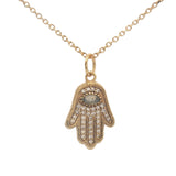 Gold necklace with hand of Fatima stone and zircons