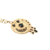 Collier doré médaillon astres en onyx noire et zircons avec pampilles 60 cm