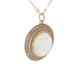 Collier doré médaillon pierre de lune et zircons 75 cm