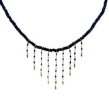 Gold necklace with stone and chains