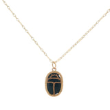 Collier doré onyx noire cabochon et scarabée doré 50 cm