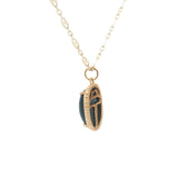 Collier doré onyx noire cabochon et scarabée doré 50 cm