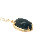 Collier doré onyx noire cabochon et scarabée doré 50 cm