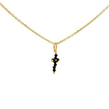 Gold necklace and stone cross