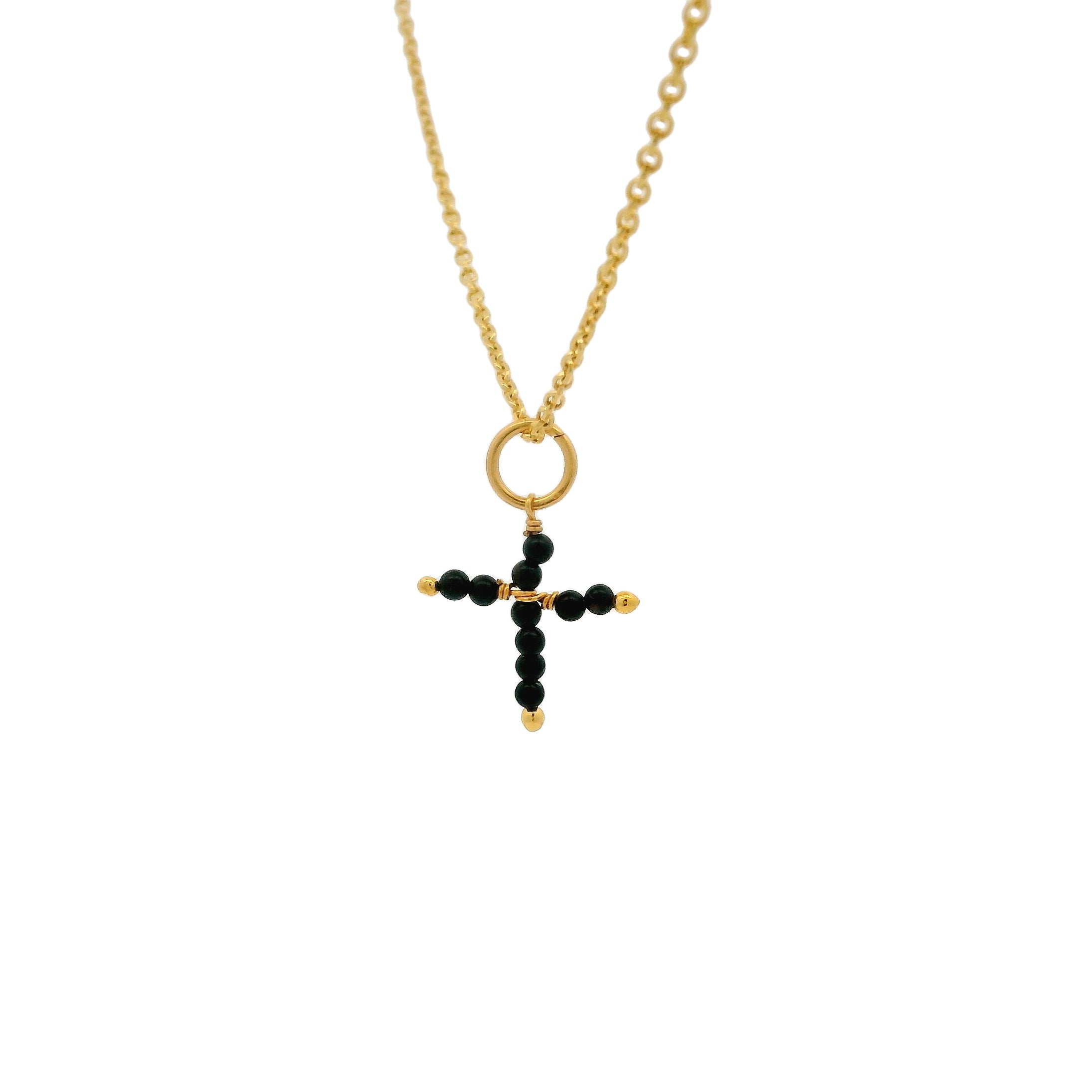 Gold necklace and stone cross
