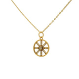 Gold necklace with openwork eye stone and zircon medal