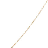 Gold necklace with hammered eye medal and stone