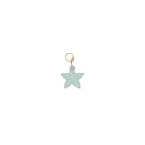 Charms doré étoile taillée dans de la topaze bleue