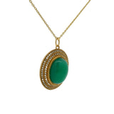 Gold necklace with cabochon stone and zircons