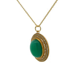 Gold necklace with cabochon stone and zircons