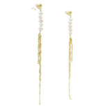 Golden pearl earrings and twisted chains