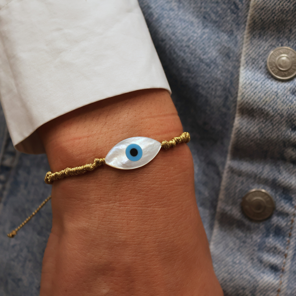 Bracelet doré cordon doré avec oeil nacre