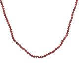 Collier doré perles rouges sur fil rouge 90 cm
