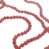 Collier doré perles rouges sur fil rouge 90 cm