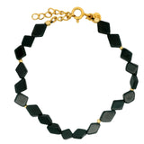 Gold bracelet with diamond-shaped stones