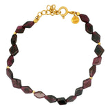 Gold bracelet with diamond-shaped stones