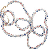 Collier doré perles bleu, blanc et rouge 75 cm