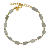 Golden bracelet with stone, tourmaline and golden discs
